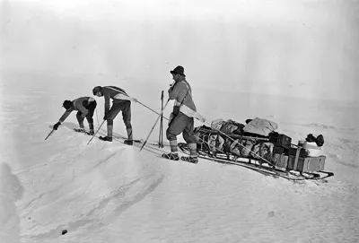 Day, Nelson, and W. Lashly probing a crevasse on Barne Glacier